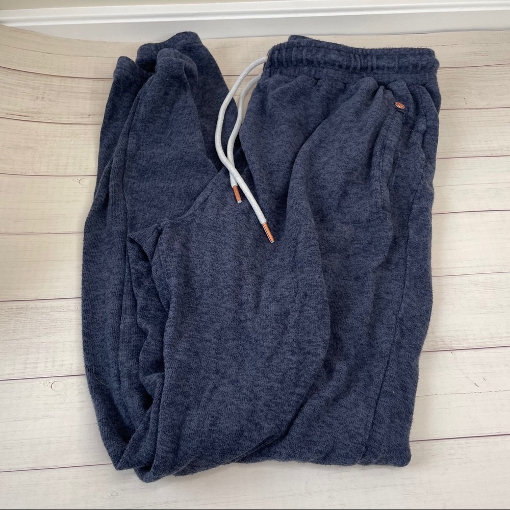 Blue joggers with elastic waistband and pockets